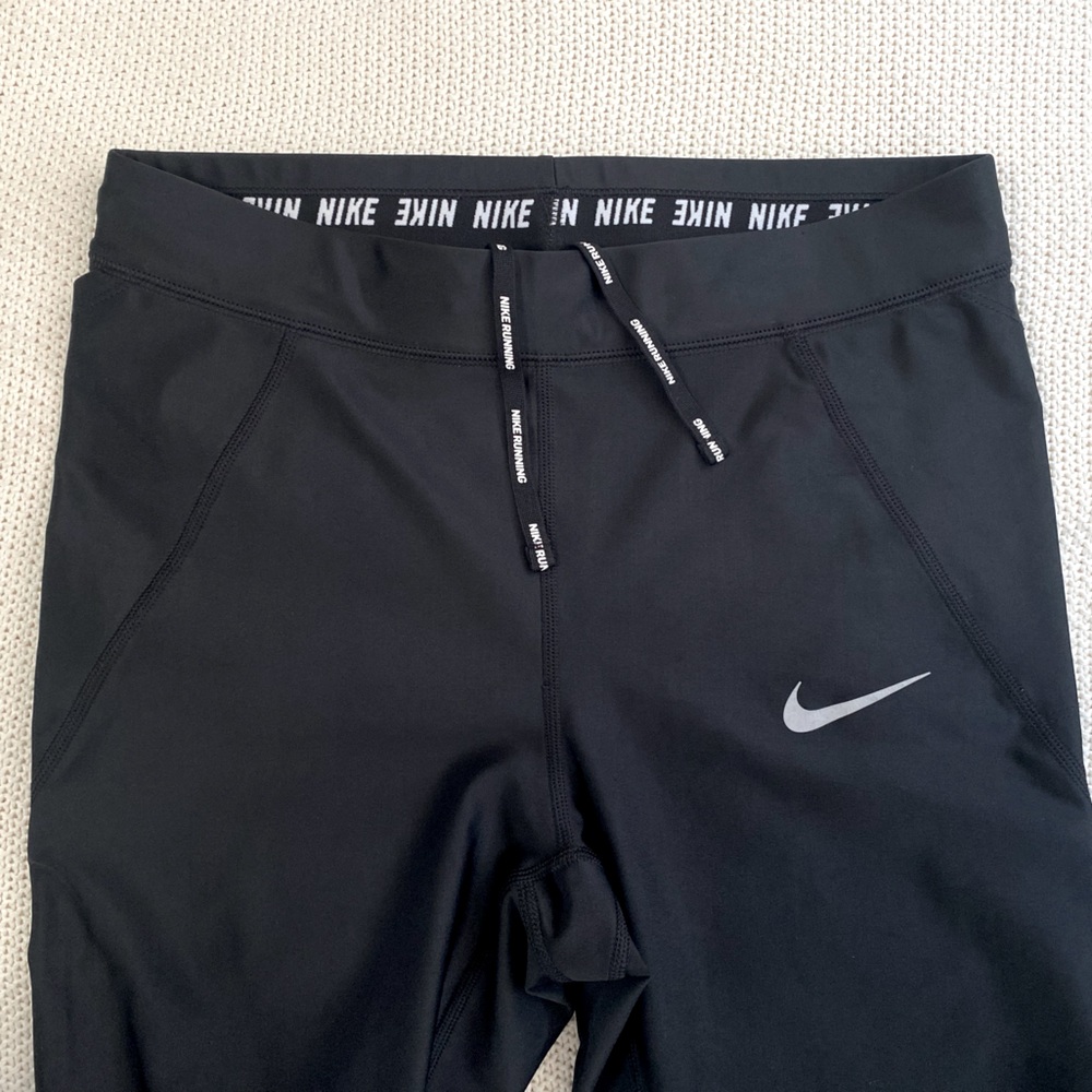 Women’s Nike running leggings, size M black w/ side pockets